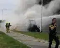 Tractor met strowagen uitgebrand