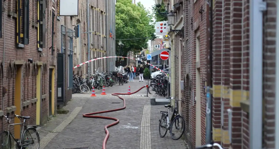 Brand in kapsalon door stapel handdoeken