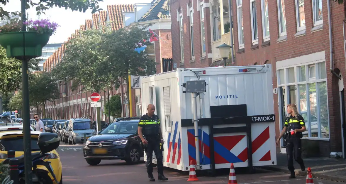 Overleden vrouw aangetroffen in woning, twee mannen aangehouden - Foto 1