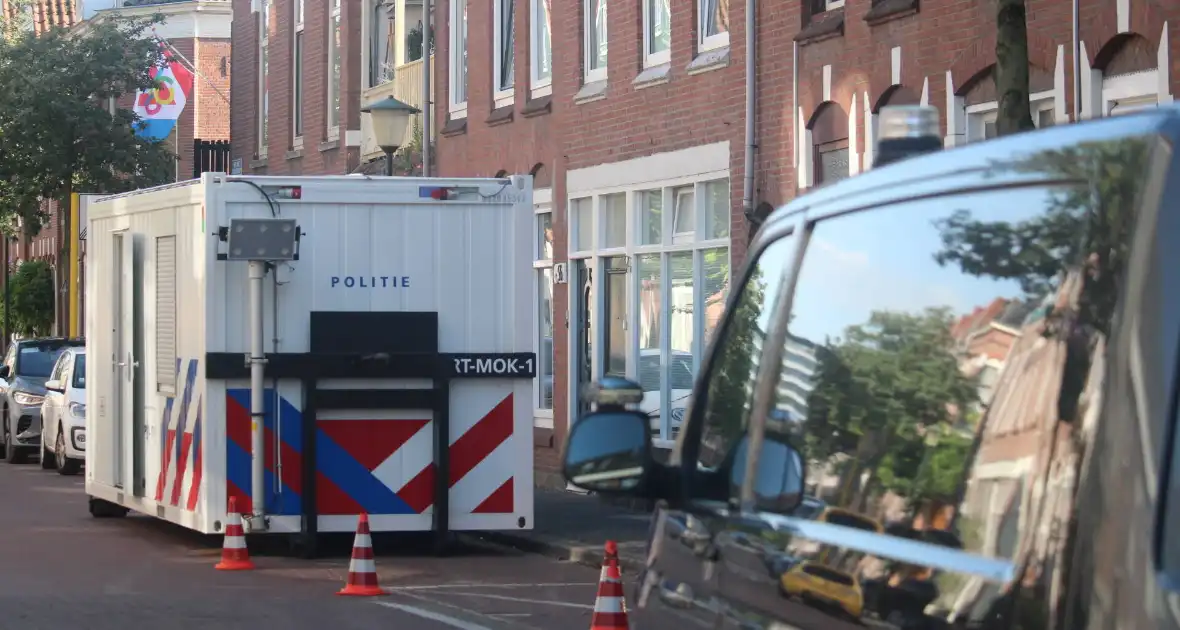 Overleden vrouw aangetroffen in woning, twee mannen aangehouden - Foto 15