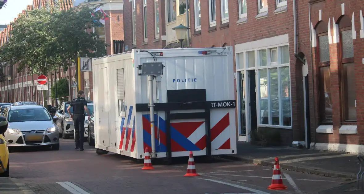 Overleden vrouw aangetroffen in woning, twee mannen aangehouden - Foto 4