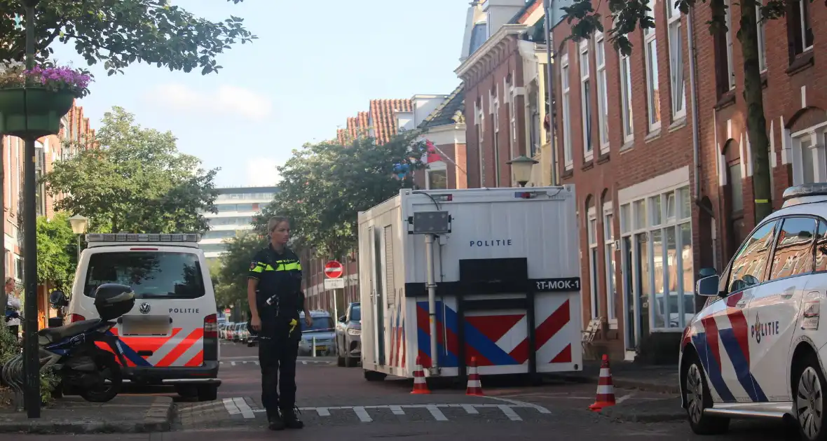 Overleden vrouw aangetroffen in woning, twee mannen aangehouden - Foto 9