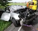 Auto belandt op de kop in sloot