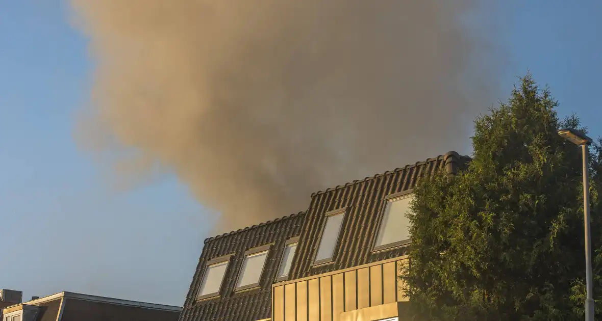 Grote uitslaande brand bij Albert Heijn - Foto 6