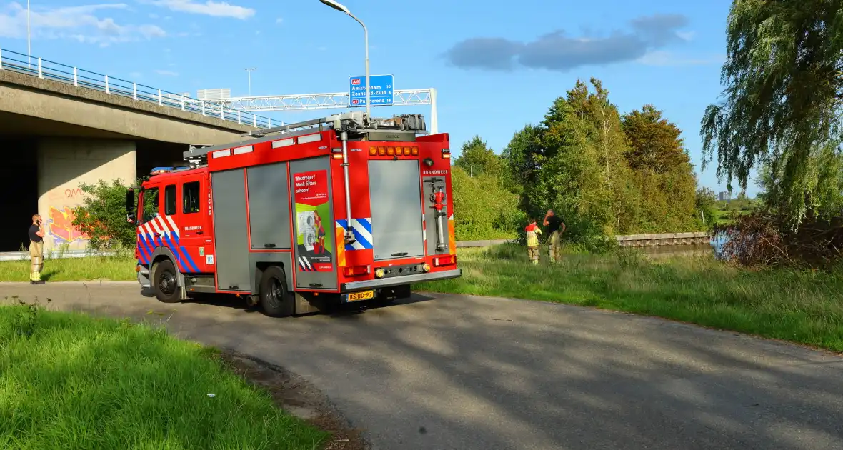 Blauw vat in sloot aangetroffen - Foto 7