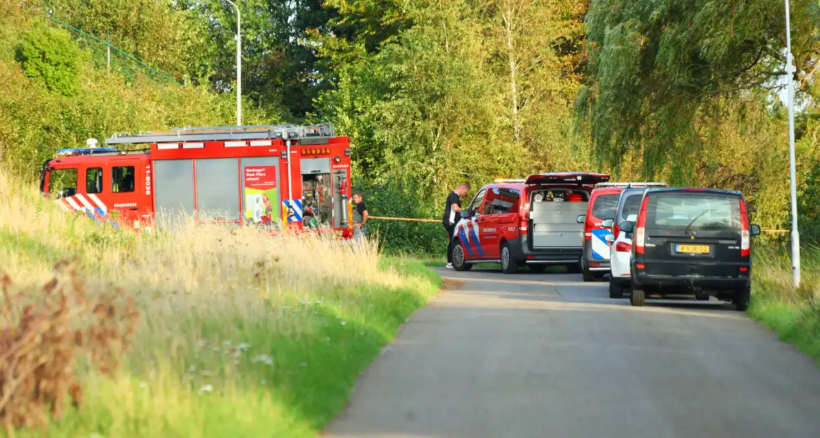 Blauw vat in sloot aangetroffen - Foto 8