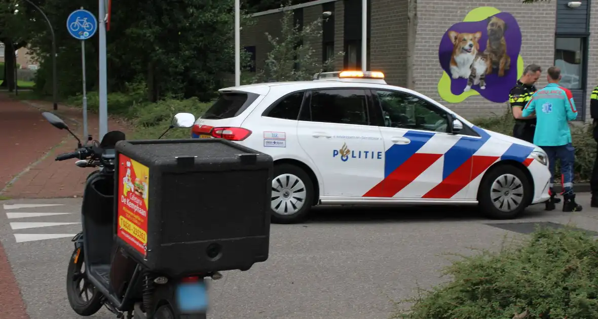 Schade bij botsing tussen auto en scooter - Foto 4