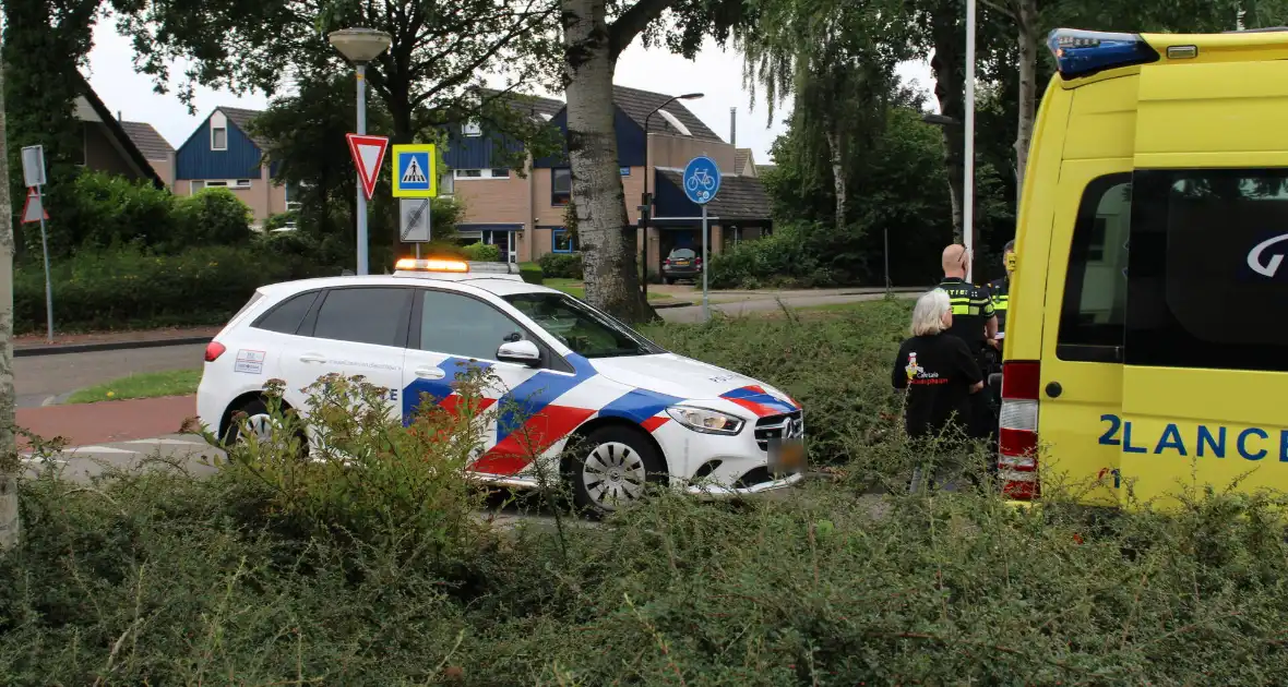 Schade bij botsing tussen auto en scooter - Foto 5
