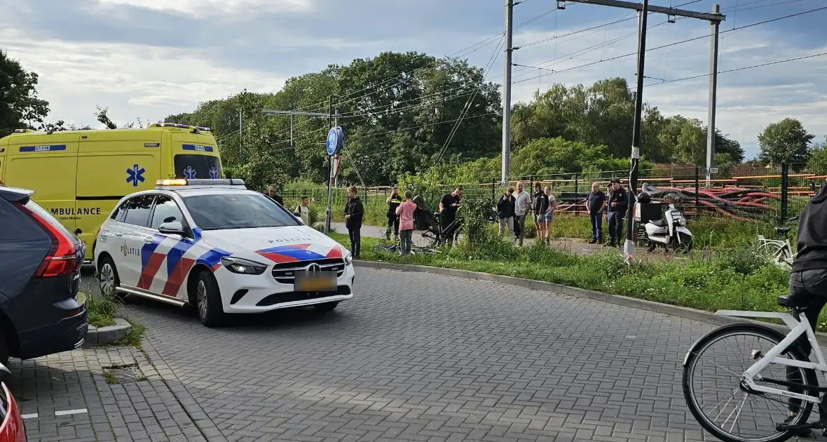 Twee maaltijdbezorgers botsen op fietspad - Foto 4