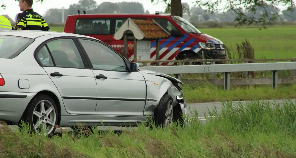 Gewonde bij botsing op kruising - Foto 10