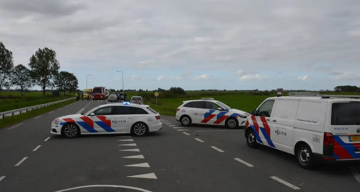 Gewonde bij botsing op kruising - Foto 6