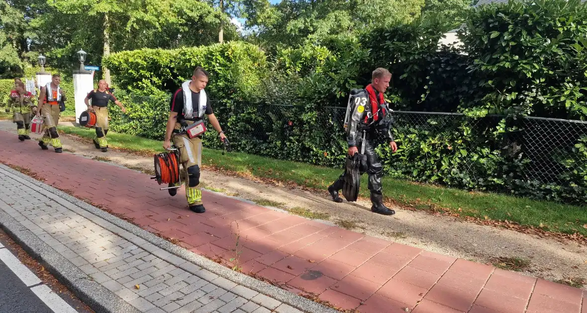 Zoekactie in water na aantreffen schoenen bij brug - Foto 2