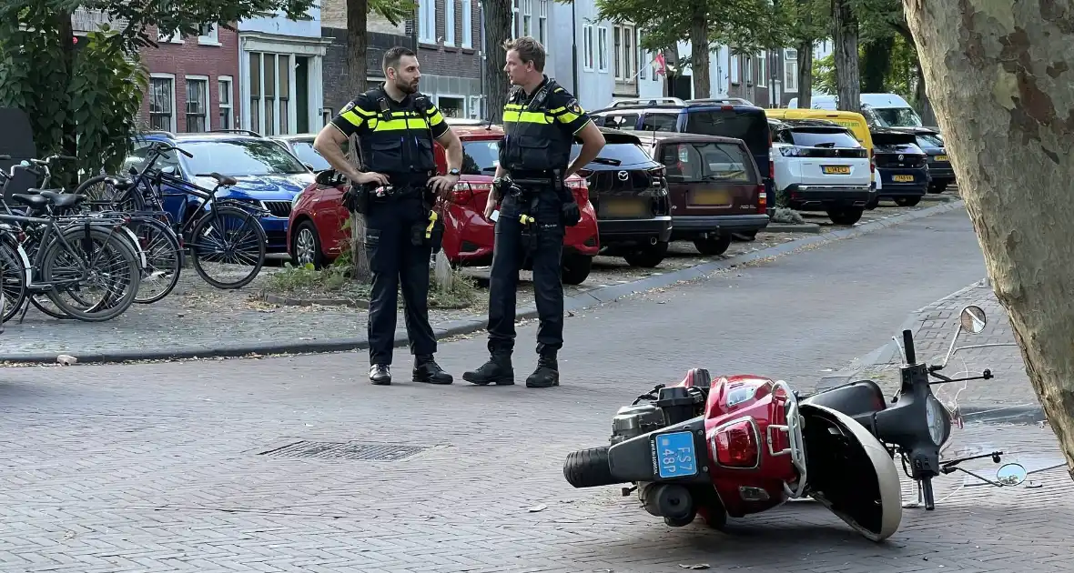 Scooterrijder gewond bij botsing op kruising - Foto 6