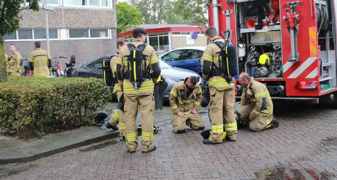 Rookontwikkeling in flat na brand