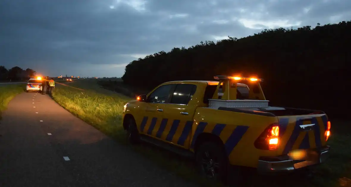 Auto aangetroffen in sloot, bestuurder verlaat voertuig - Foto 7