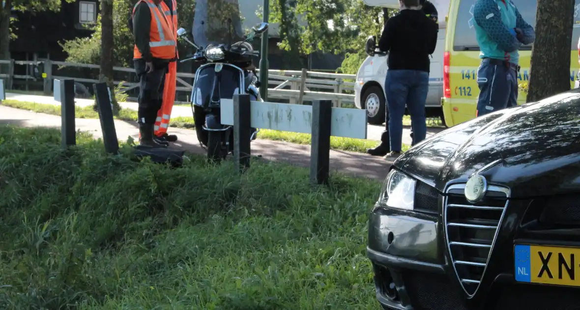 Aanrijding tussen auto en scooter - Foto 4