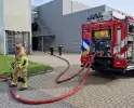 Brandweer schaalt op bij brand in bedrijfsverzamelpand
