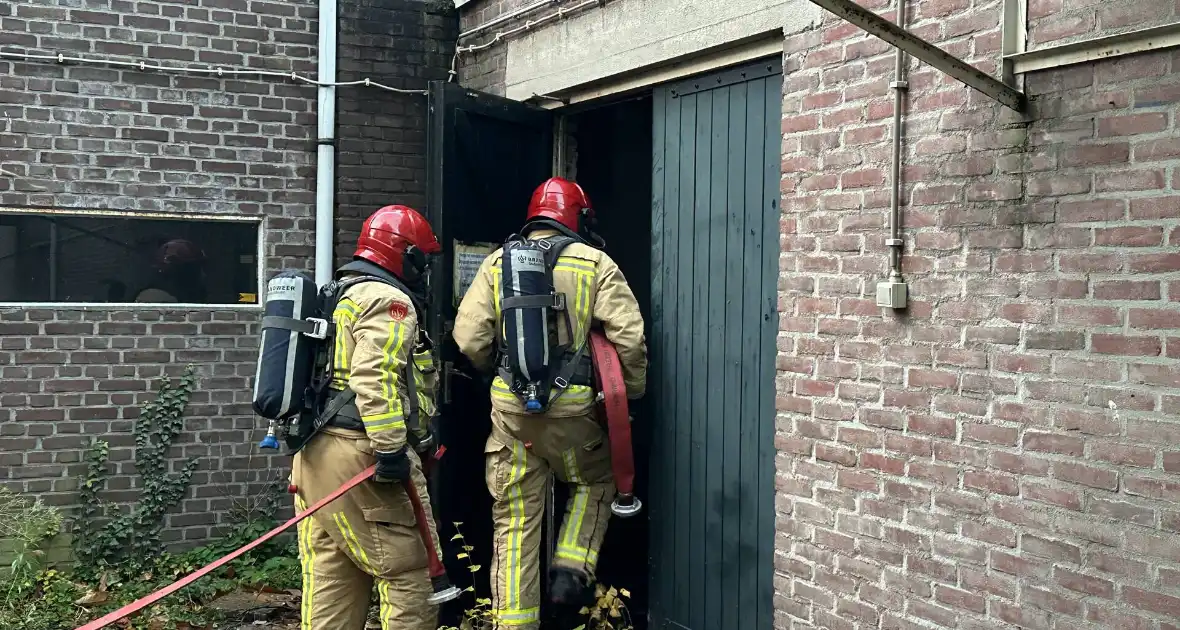 Rookontwikkeling bij brand in oude textielfabriek - Foto 6