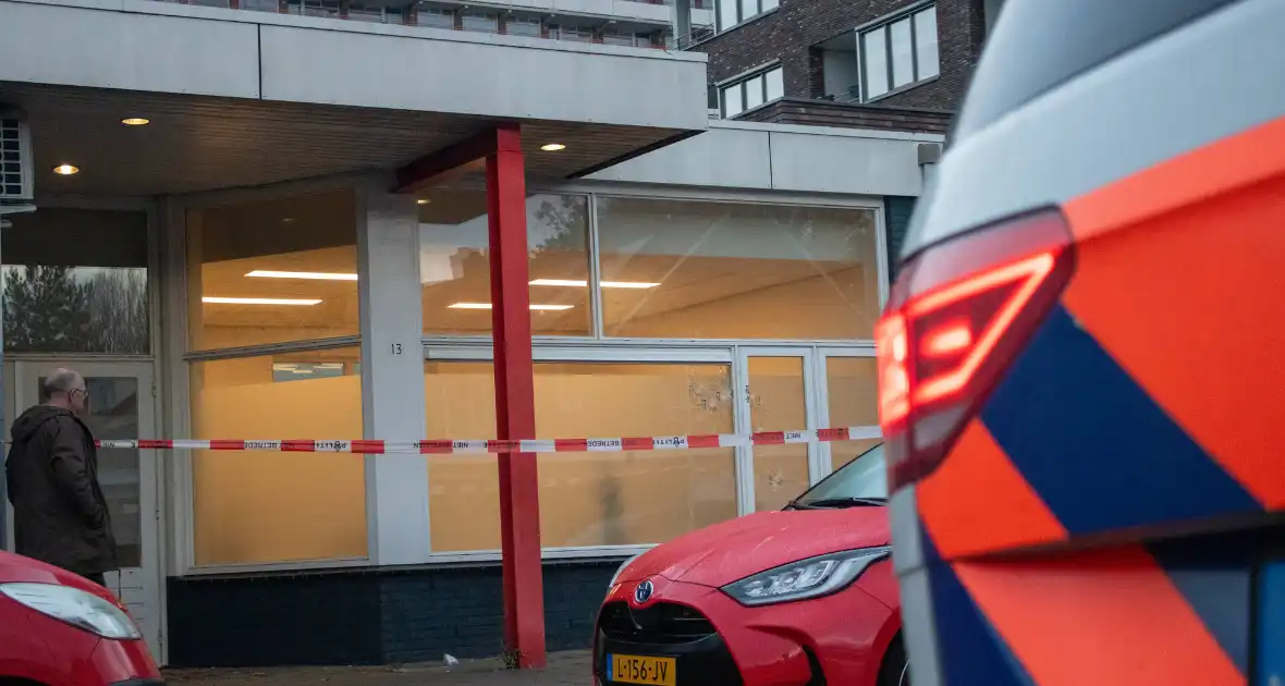 Kogelgaten aangetroffen in bedrijfspand - Foto 9