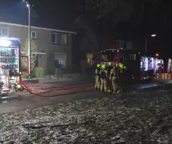 Veel schade na brand onder carport