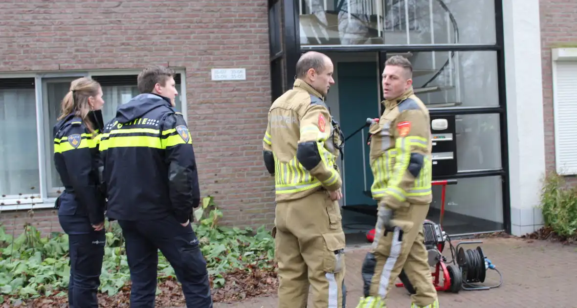 Brandweer forceert deur wegens woningbrand