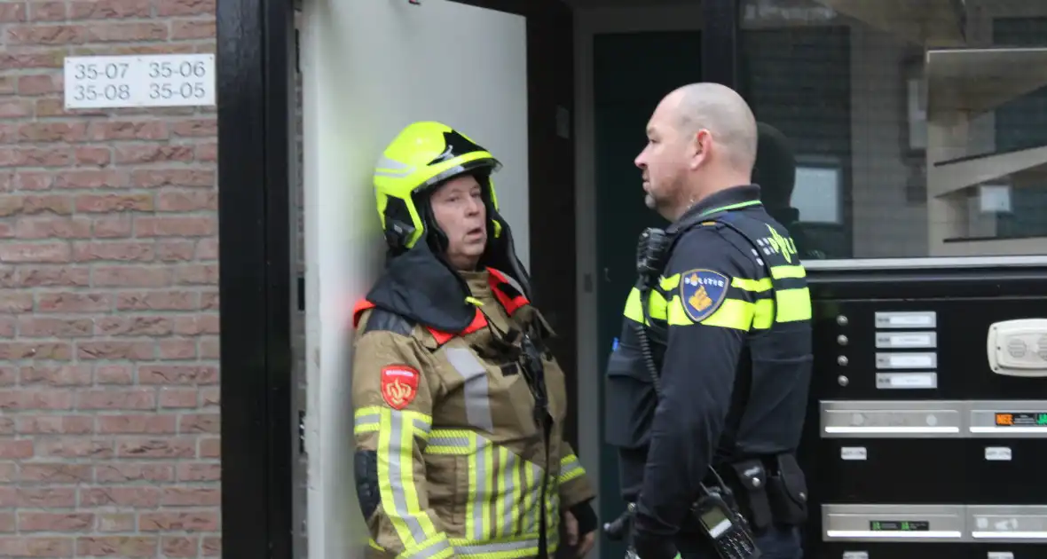 Brandweer forceert deur wegens woningbrand - Foto 4