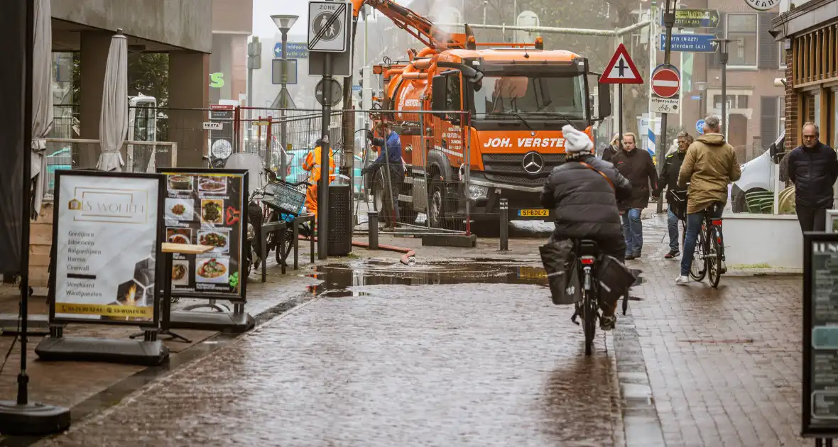 Winkelstraat afgesloten door waterleidingbreuk - Foto 5