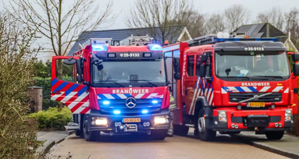 Zolder loopt flinke schade op door brand - Foto 1