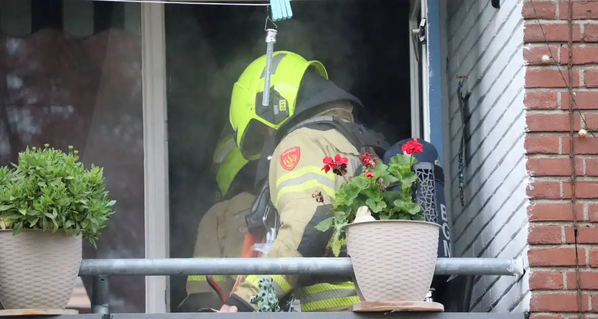 Rook in woning door pannetje op het vuur - Foto 3