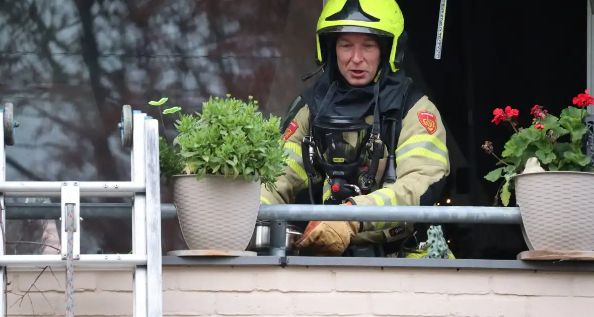 Rook in woning door pannetje op het vuur - Foto 5