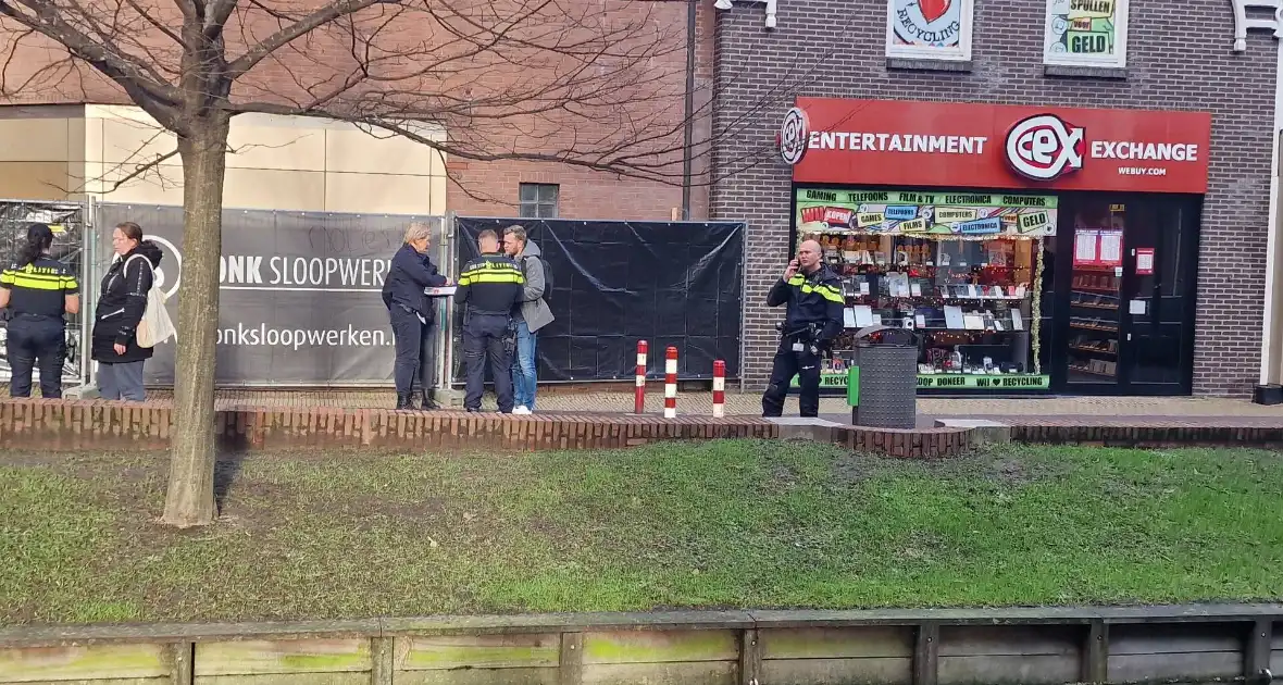 Drie aanhoudingen na overval op winkel - Foto 5