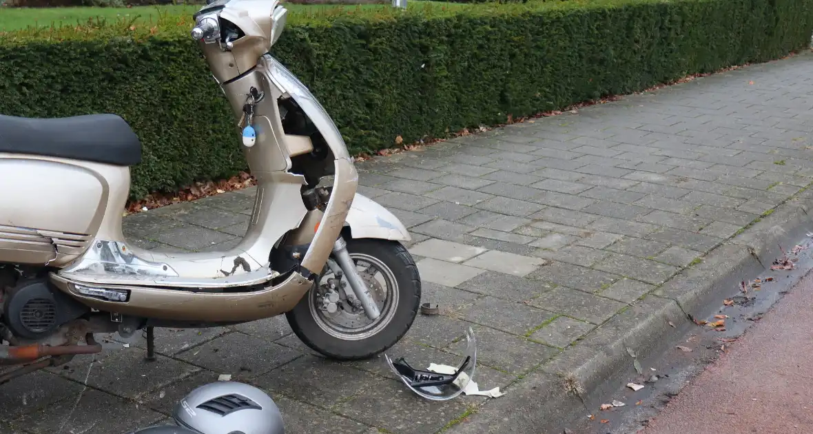 Schade bij ongeval tussen scooterrijder en automobilist - Foto 5