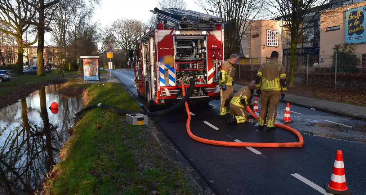 Meerdere garageboxen onderwater door hevige regenval - Foto 2