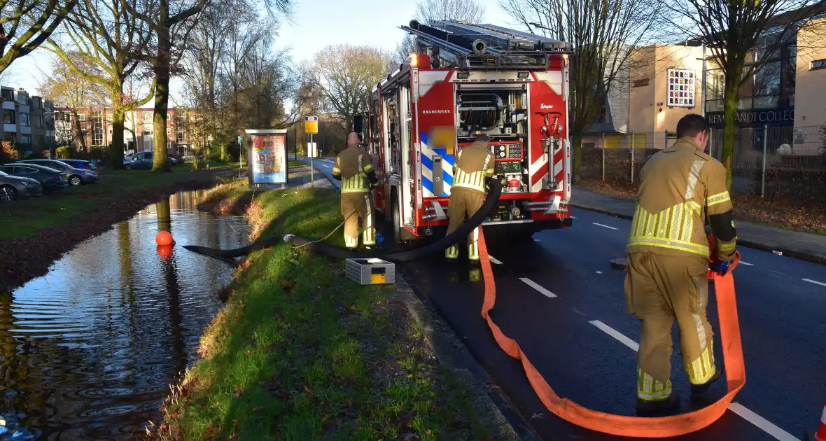 Meerdere garageboxen onderwater door hevige regenval - Foto 3