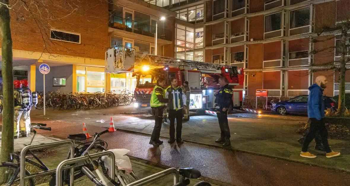 Woningen uit flat geëvacueerd door brand - Foto 10