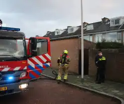 Flinke rookontwikkeling door brand na kortsluiting in koelkast