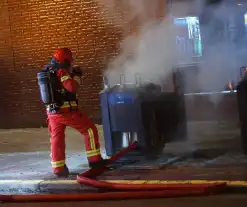 Ondergrondse papiercontainer in brand