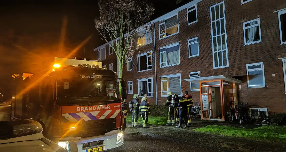 Bewoner aangehouden na brandmelding - Foto 4