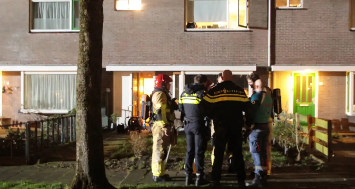 Persoon en hond uit brandende woning gered - Foto 3