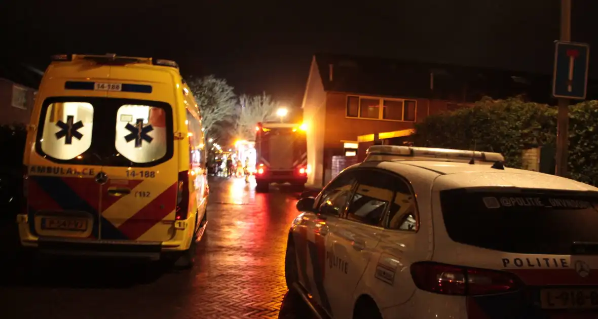 Persoon en hond uit brandende woning gered - Foto 6