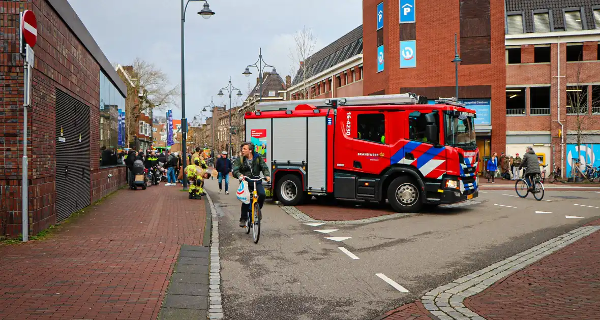 Prullenbak vat vlam in parkeergarage - Foto 8