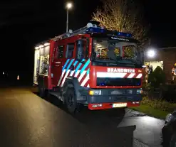 Woning vol rook door brandende kerstkrans