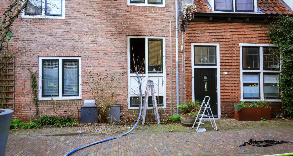 Veel schade bij woningbrand - Foto 3