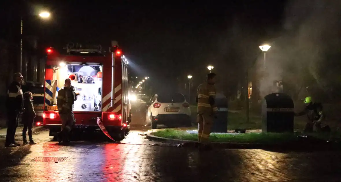 Ondergrondse container in brand gestoken - Foto 2