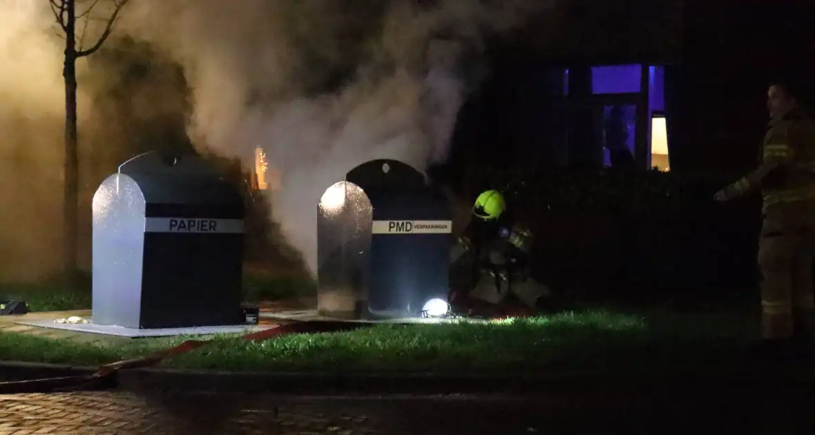 Ondergrondse container in brand gestoken - Foto 4