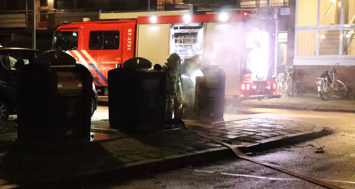 Rookontwikkeling door brand in ondergrondse container - Foto 1