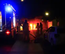 Koelkast in brand gestoken tegen zeecontainer aan