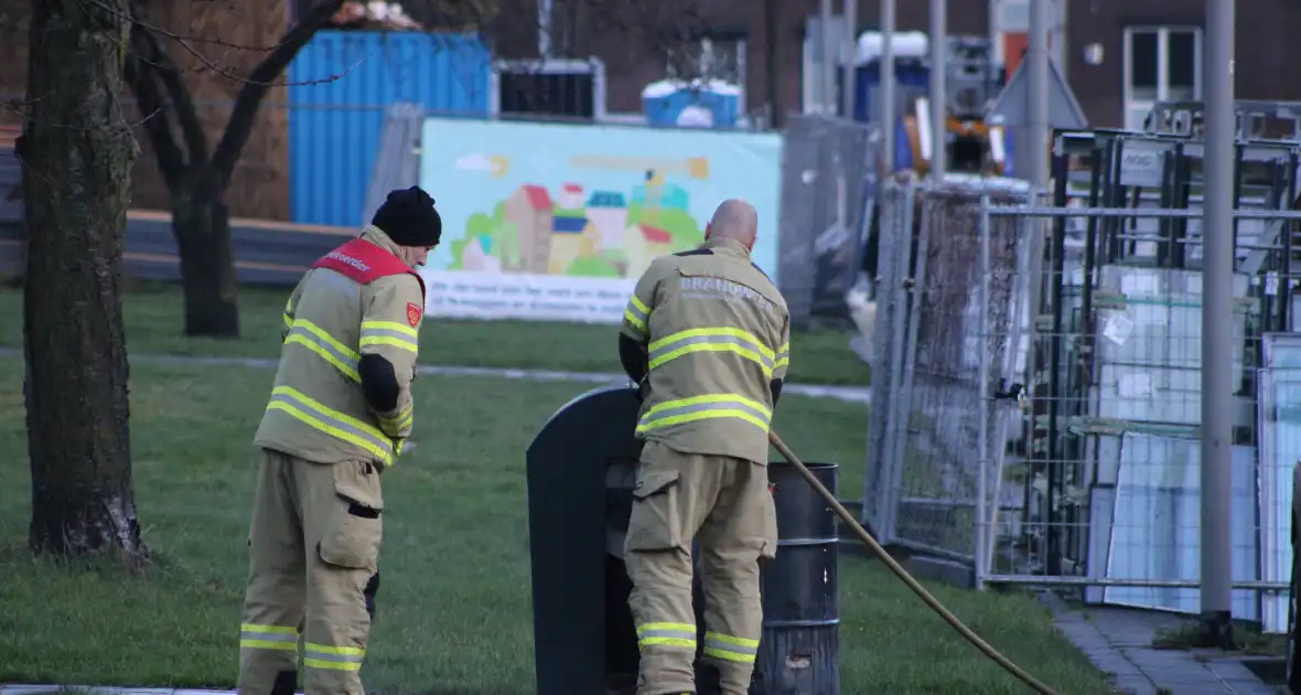 Brand in container door leeggooien vuurton - Foto 1