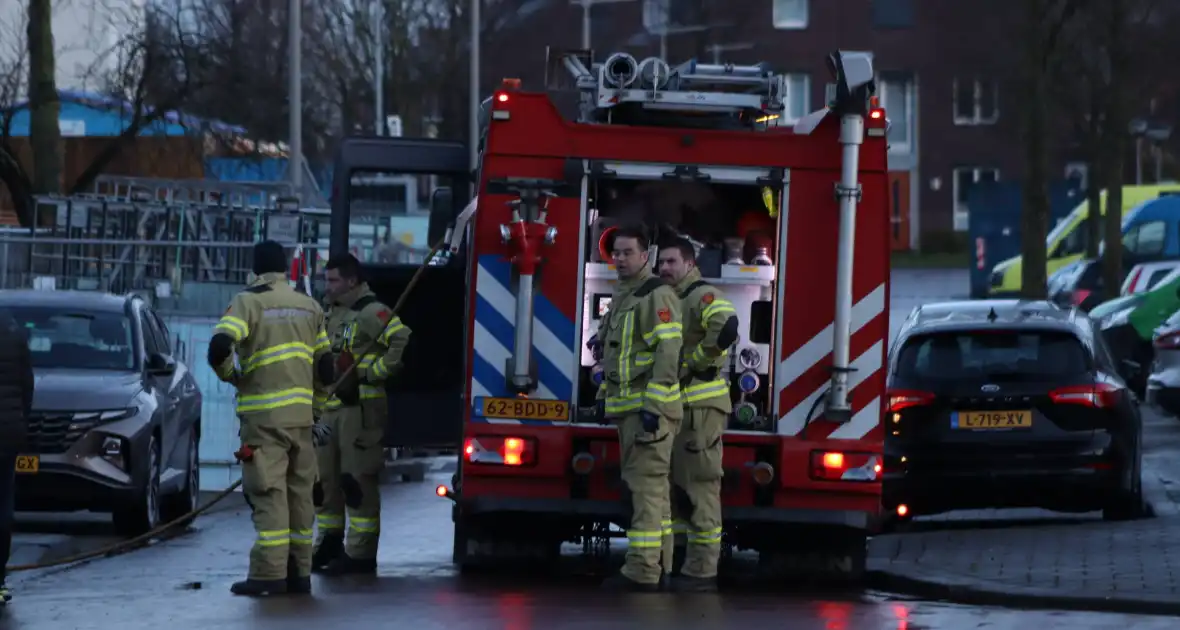 Brand in container door leeggooien vuurton - Foto 3