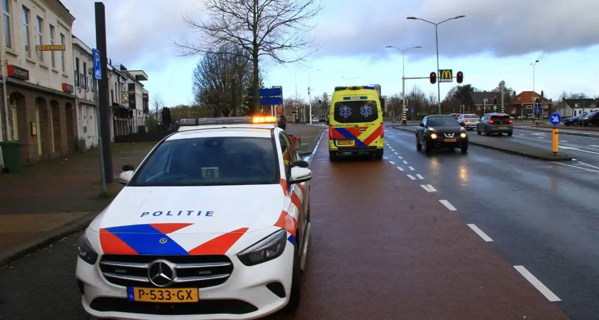 Persoon hard ten val met elektrische fiets - Foto 1